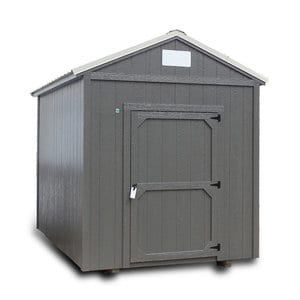 grey utility shed with white metal roofing